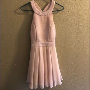 Blush pink dress with simmering affect